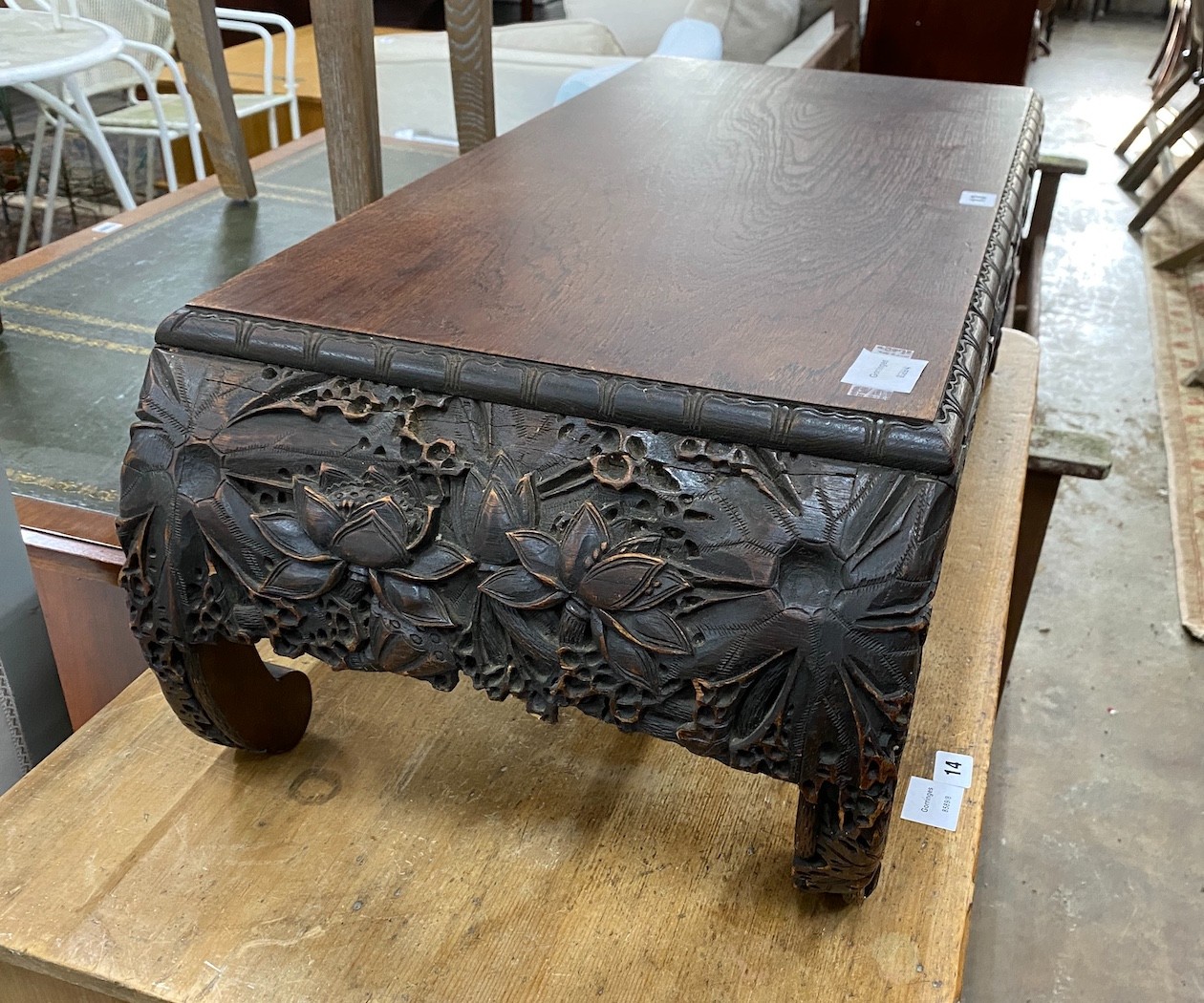 A Malaysian carved hardwood low table, width 92cm, depth 40cm, height 29cm